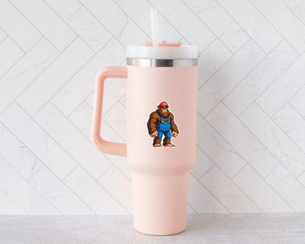 A Bigfoot sticker that looks like Mario on a Stanley Cup.