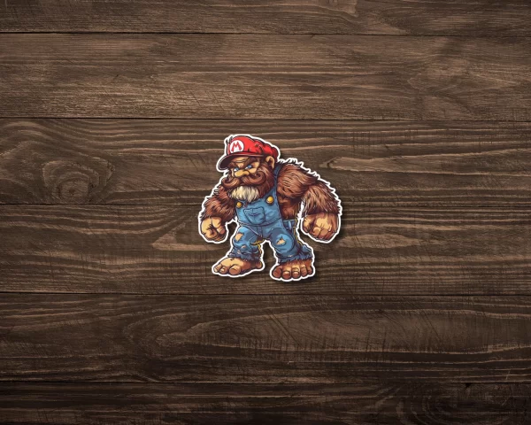 A Bigfoot sticker that looks like Mario on a table