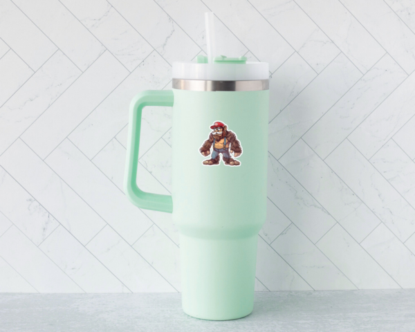 A sticker of Bigfoot as Mario on a Stanley Cup